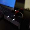 Desktop Chord Electronics Qutest DAC connected to a laptop