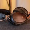 Close-up of Meze Audio LIRIC 2 headphones showcasing macassar ebony earcups