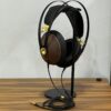 Meze 99 Classics headphones displayed on a headphone stand