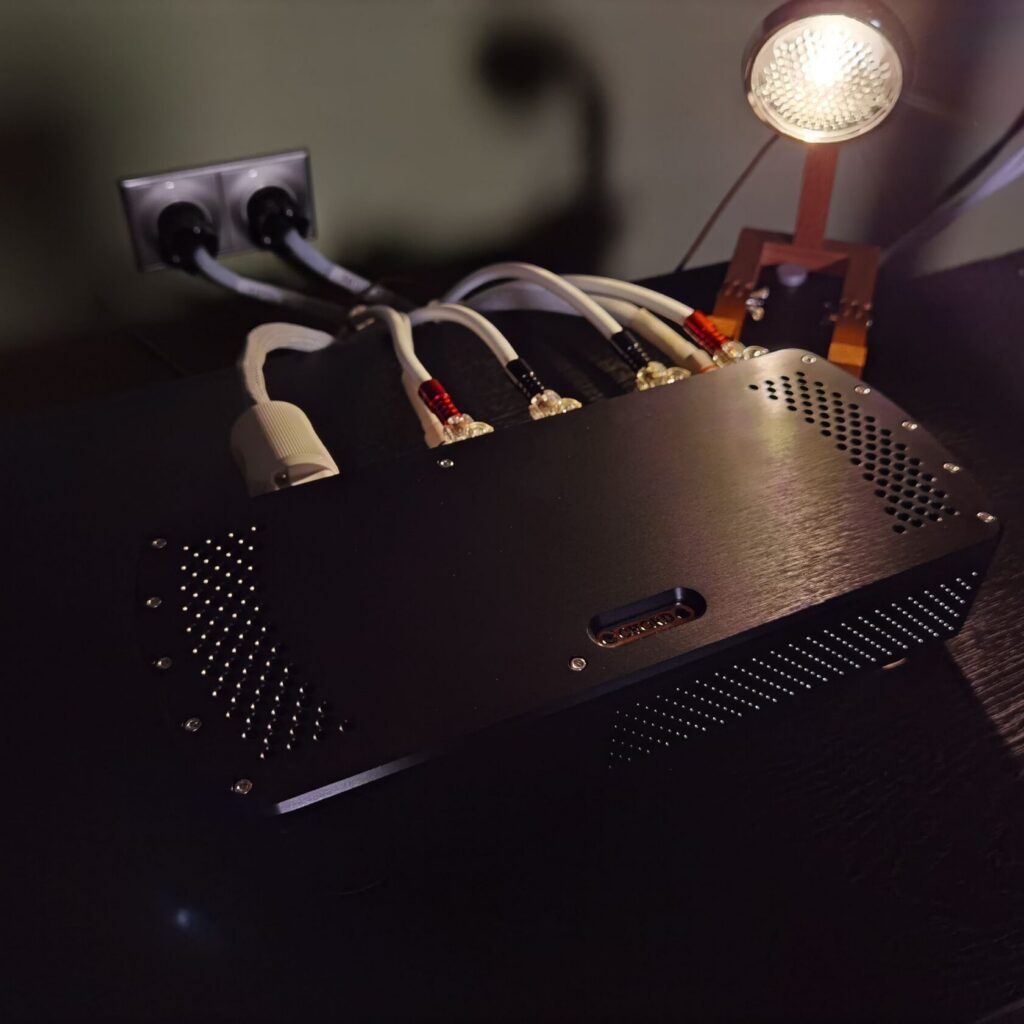 Chord Electronics Étude showcased in a valve-inspired interior setting