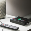 Chord Electronics Hugo 2 used as a DAC in a home audio system with remote control