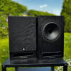 Fyne Audio F5E – standmount speakers photographed outdoors.