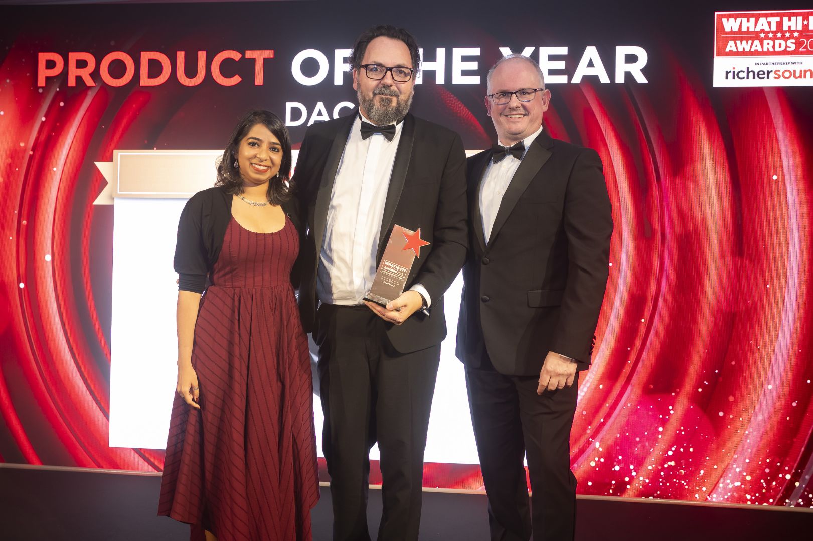 Colin Pratt, Sales & Marketing Director (centerstage), with the Award