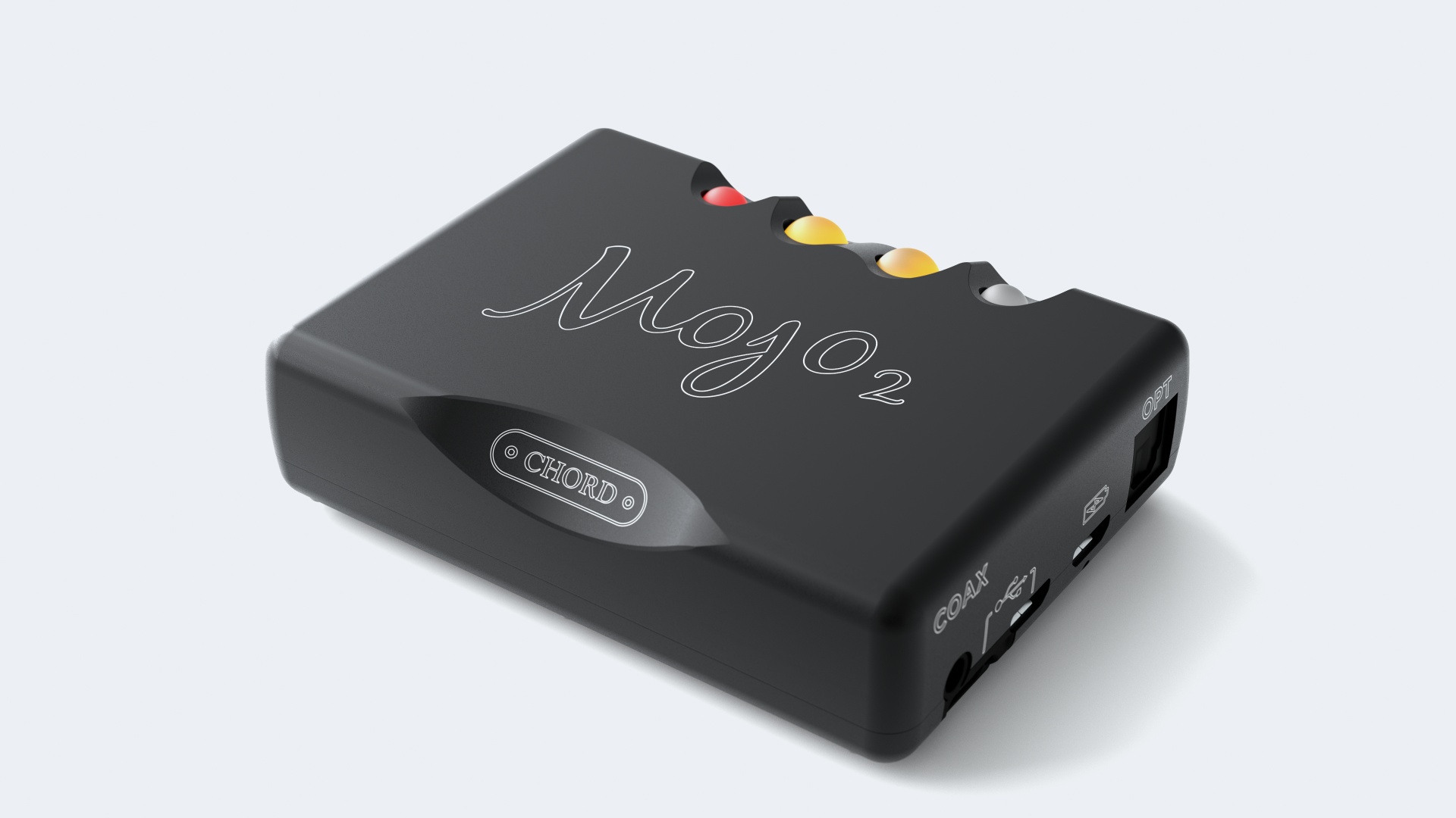 Chord Electronics Mojo 2 DAC and headphone amp is positioned in this photo diagonally on a flat service. The spherical controls are on the back of the unit in this photo