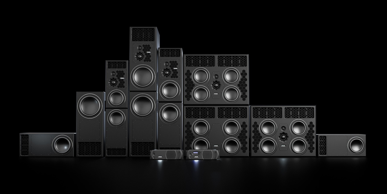 A family portrait: PMC active studio monitors in one frame on a black blackground. The line up includes all new PMC10, PMC12, PMC15 and PMC10-4 presented at NAMM SHow in California
